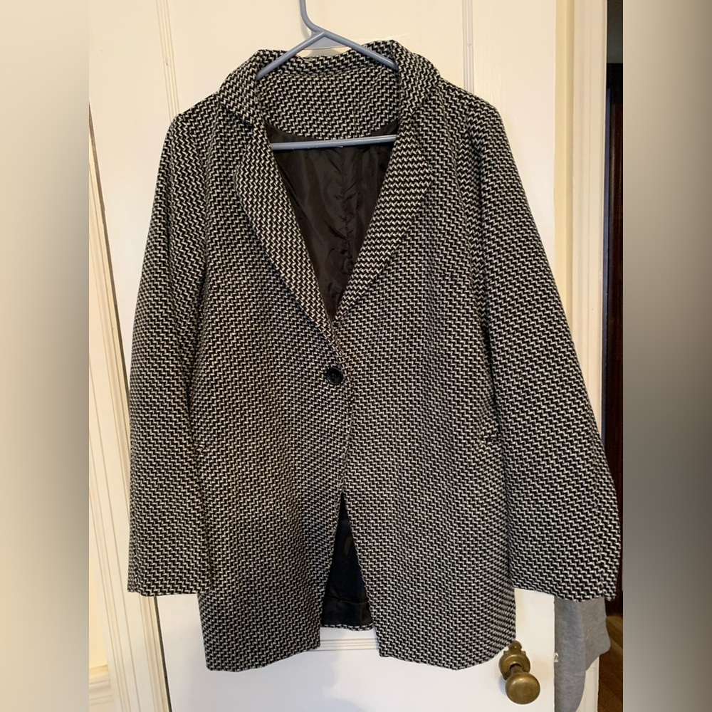 Black and white tweed car coat.